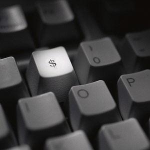 Dollar sign on keyboard copyright Corbis