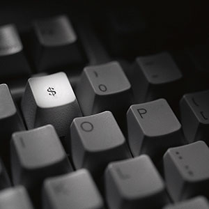 Dollar sign on keyboard copyright Corbis