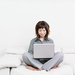 Woman with laptop copyright Noel Hendrickson, Digital Vision, Getty Images