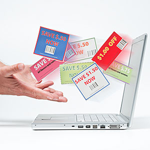 Hands catching shopping coupons copyright Vstock LLC, Tetra images RF, Getty Images