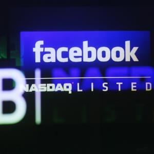 File photo of the Facebook logo on a screen inside the Nasdaq Marketsite in New York (© Shannon Stapleton/Newscom/Reuters)