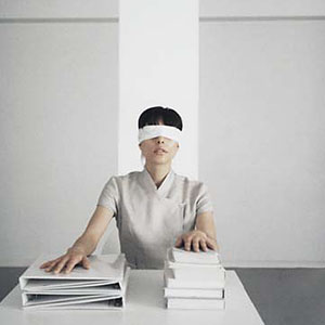Image: Blindfolded woman (© PhotoAlto/Jupiterimages)