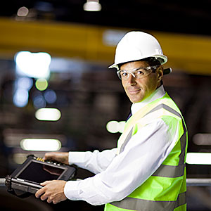 Engineer with handheld computer copyright Image Source, Getty Images