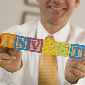 Investment building blocks copyright Comstock Images, Jupiterimages
