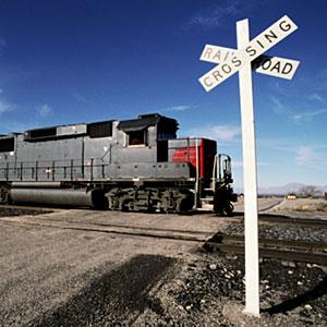 Railroad Crossing with Train copyright Edmond Van Hoorick, Photodisc, Getty Images