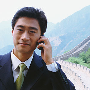 Image: Businessman in China (© Brooklyn Production/Corbis)