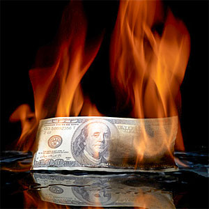 Burning money © Lumina Imaging, Digital Vision, Getty Images