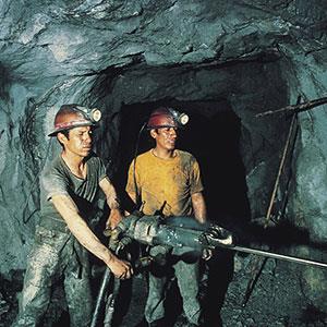Coal miners (© Digital Vision/SuperStock)