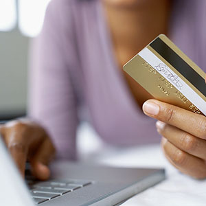 Credit card Computer (copyright Stockbyte/SuperStock)