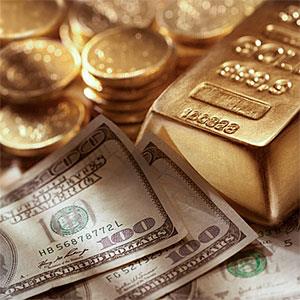 Hundred dollar bills surrounded by gold © Anthony Bradshaw, Photographer