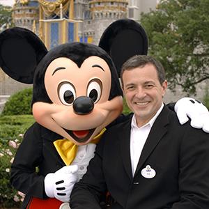 Bob Iger with Mickey Mouse © Gene Duncan/Disney/AP Photo