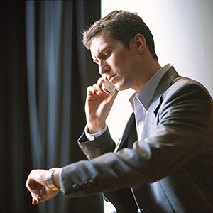 Image: Businessman checking watch © Gerard Launet, PhotoAlto Agency RF, Getty Images