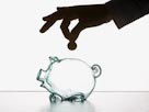 Image: Piggy bank (© Corbis)