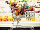 Image: Full Shopping Cart in Grocery Store © Fuse/Getty Images