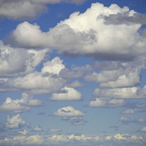 Logo: Clouds in a blue sky (Purestock/Getty Images)