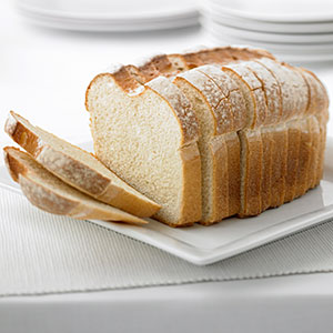 Logo: Close up of fresh sliced loaf of bread (Adam Gault/OJO Images/Getty Images)