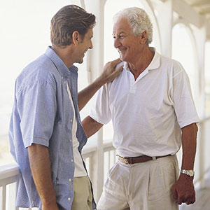 Logo: Adult with elderly parent (Digital Vision/SuperStock)