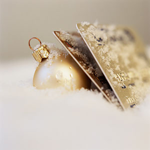 Logo: Ornament and credit cards (Tom Grill/Corbis)
