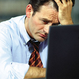 Image: Worried Man (Corbis)