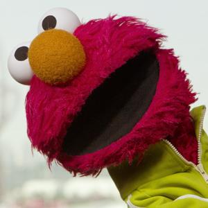 Credit: Joel Ryan/AP Photo
Caption: File photo of Elmo from Sesame Street visiting the Olympic Park in east London on Aug 10, 2012
