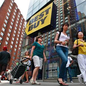 Credit: BRENDAN MCDERMID/Newscom/RTR
Caption: People walk past a Best Buy store in New York in August 2012
Image File Name: BestBuy_100412_RM_300