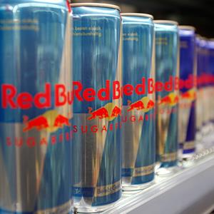 Red Bull drink cans are seen in a supermarket. Credit: © Leonhard Foeger/Reuters