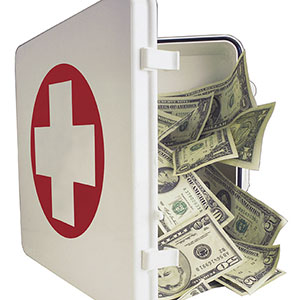 Image: Insurance Money (© Comstock Images/Jupiterimages)