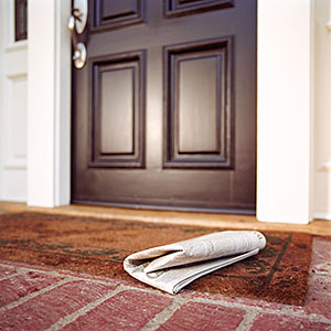 Image: Newspaper on front step of house (© Siri Stafford/Photodisc/Getty Images)