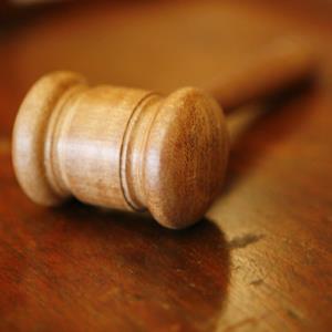 Gavel on a table (copyright Lee Thompson/Getty Images)