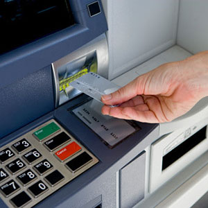 Image: Cash machine (© Compassionate Eye Foundation/Getty Images/Getty Images)