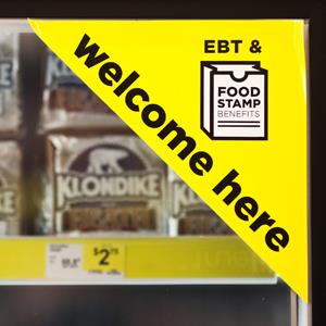 A sign on a frozen food case indicates that food stamps are accepted at the Dollar General Corp. store in Saddle Brook, New Jersey (© Emile Wamsteker/Bloomberg via Getty Images)