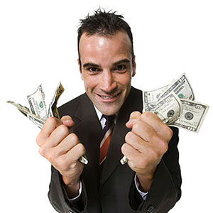 Image: Man holding cash © Rubberball, Getty Images