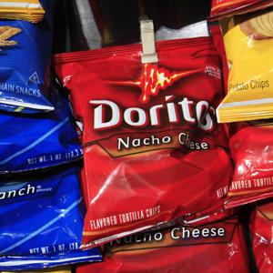 File photo of a bag of Doritos among other chips, at a kiosk in New York (© Mark Lennihan/AP Photo)