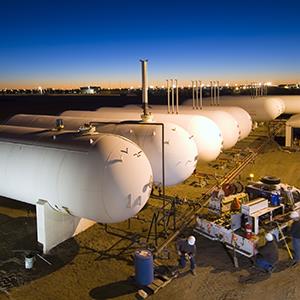 Natural gas tanks at a site in North Dakota (© Rich LaSalle/The Image Bank/Getty Images)