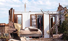 Home damaged by tornado in Moore, Okla. (©Rick Wilking/Reuters)