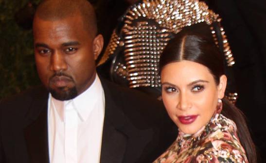 Kanye West and Kim Kardashian/WENN