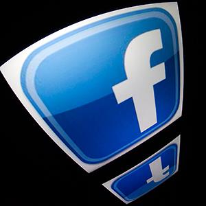 Caption: The Facebook logo is seen on a tablet screen
Credit: © Lionel Bonaventure/AFP/Getty Images