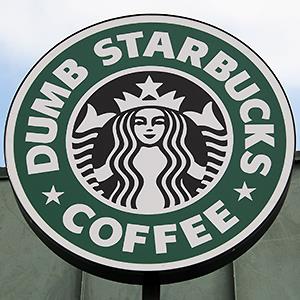 Credit: © David Livingston/Getty Images
Caption: A Dumb Starbucks Coffee Shop sign is seen on February 9, 2014 in Los Angeles, Calif.