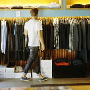 Nicho Sodling/Folio Images/Getty Images
Man shopping for clothes