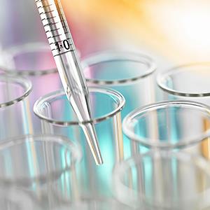 Credit: © Rafe Swan/Corbis
Caption: A graduated pipette being inserted into test tube