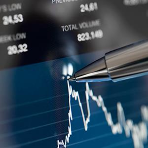 Caption: Analyzing stock market from computer screen
Credit: © MicroWorks/Getty Images