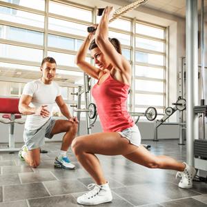 Woman working out with personal trainer
© Milan Zeremski/Getty Images
