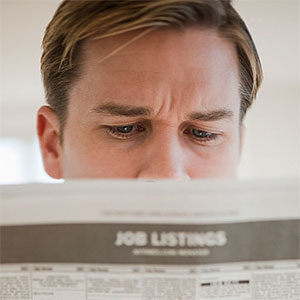 Man reading job listings © Tetra Images, Getty Images