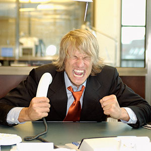 Image: Angry businessman (© Imagesource/Corbis)