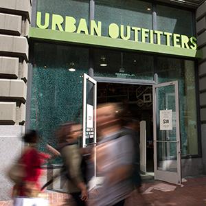 Pedestrians walk past the Urban Outfitters Inc. store in San Francisco, Calif. (© David Paul Morris/Bloomberg via Getty Images)