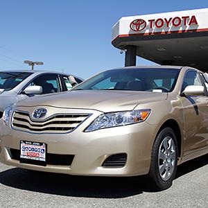 A Toyota Camry parked at a car dealership in San Jose, Calif. Credit: © Paul Sakuma/AP
