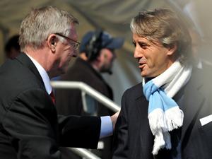Sir Alex Ferguson and Roberto Mancini (Martin Rickett-PA Archive)
