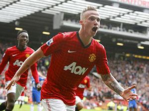 Manchester United's Alexander Buttner celebrates scoring his third goal during the Barclays Premier League match at Old Trafford.