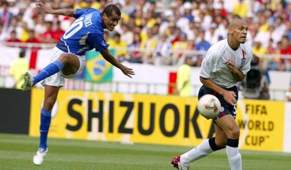 Rivaldo scores against England as Rio Ferdinand turns his back in the 2002 World Cup - PA