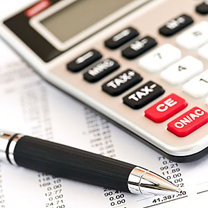 Image: Calculating numbers for income tax return with pen and calculator © Stockbrokerxtra Images, Photolibrary